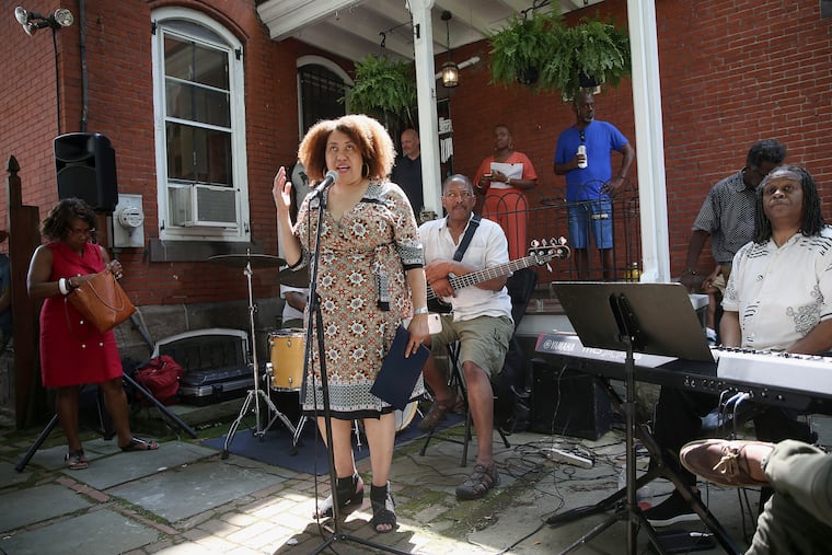Monique Greenwood speaks during an open house at the new Akwaaba Bed and Breakfast in West Philadelphia on Wednesday, July 4, 2018. The Philadelphia location is the latest addition to the bed and breakfast chain started by Greenwood and her husband, Glenn Pogue. TIM TAI / Staff Photographer