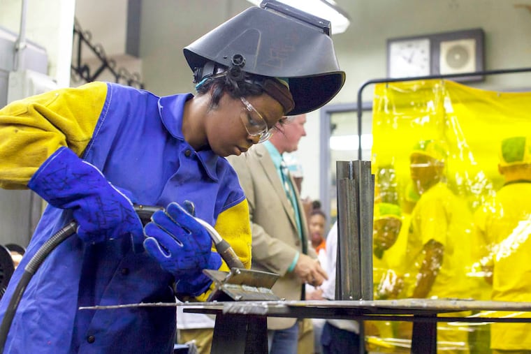 A. Philip Randolph Career & Technical High School welding program only female student Denisia McCray help to build the Amnesty Boxes that will be placed in Philadelphia schools for safe, anonymous collection of prohibited items such as guns and illegal drugs.
Chanda Jones / Staff Photographer