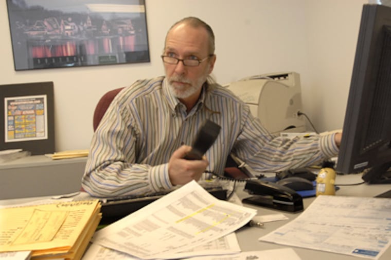 John Flynn Chrysler Jeep general manager Jim Atkins: "My boss' company isn't in bankruptcy, Chrysler is. I'm not going to worry because nothing has happened yet." (April Saul / Staff Photographer)