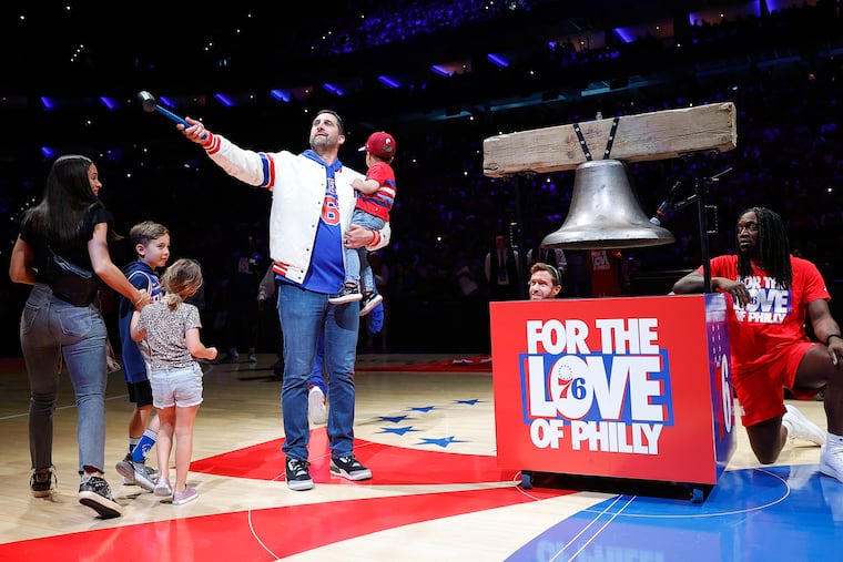 Eagles Head Coach Nick Sirianni prepares to ring the ceremonial bell with is family before the Sixers played the Brooklyn Nets.