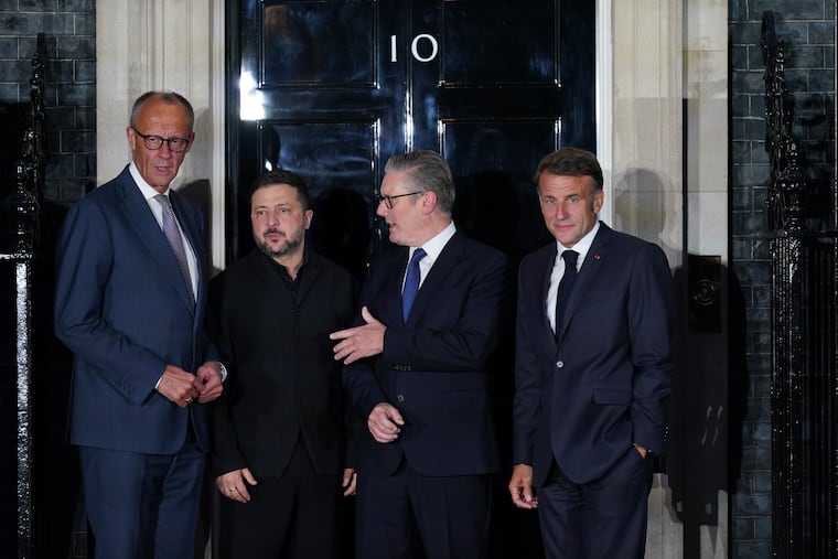 From left, Germany's Chancellor Friedrich Merz, Ukraine's President Volodymyr Zelenskyy, Britain's Prime Minister Keir Starmer, and France's President Emmanuel Macron pose on the doorstep of 10 Downing Street after their meeting in London, Sunday, June 7, 2026.