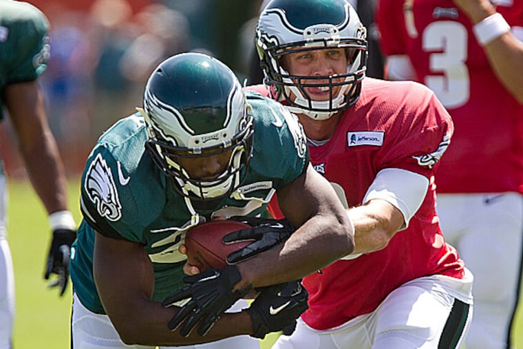 Eagles quarterback Nick Foles and running back LeSean McCoy. (David M Warren/Staff Photographer)