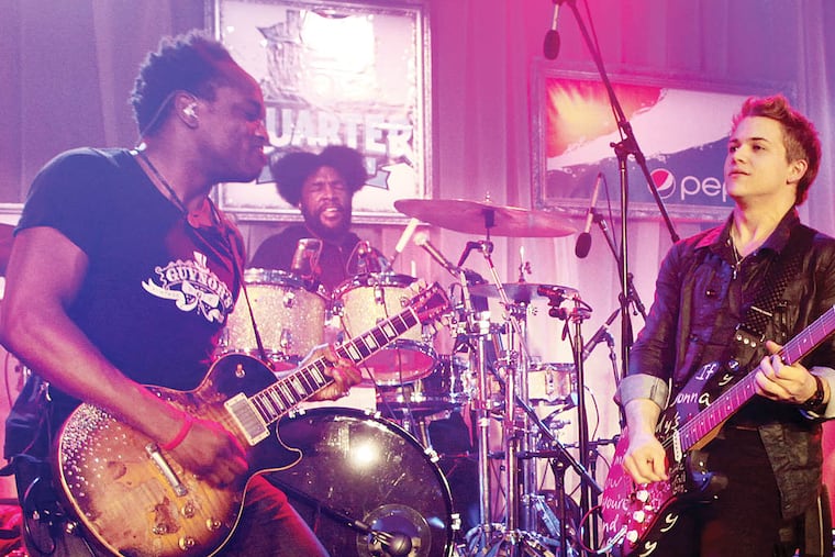 IMAGE DISTRIBUTED FOR PEPSI - Captain Kirk Douglas and ?uestlove of The Roots, Hunter Hayes, F. Knuckles, Damon "Tuba Gooding Jr." Bryson and Mark Kelley of The Roots perform at the Pepsi 5th Quarter in the French Quarter Post Super Bowl Party, on Sunday, Feb. 3, 2013, in New Orleans. (Photo by Barry Brecheisen/Invision for Pepsi/AP Images)