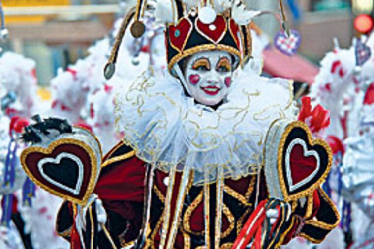 A members of the Trilby String Band struts on Broad Street. (Bonnie
Weller/Inquirer)