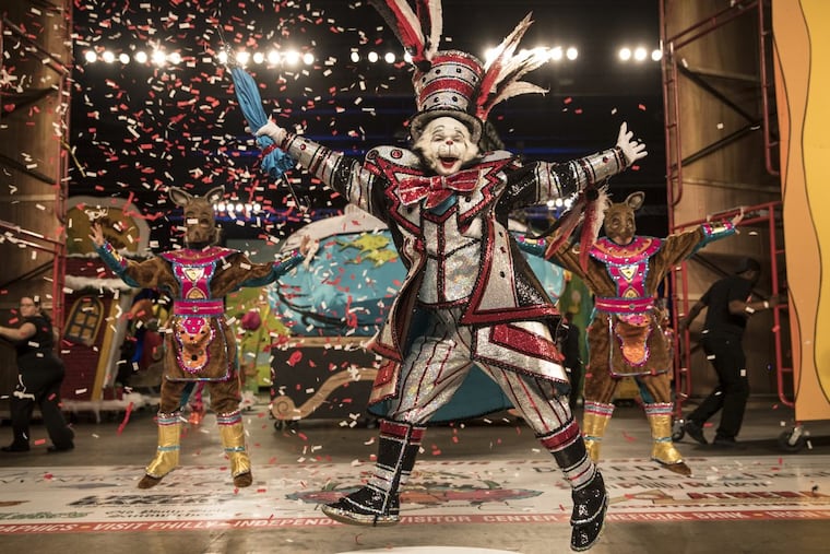 Clevermore Captain Rocco Tursi, center, is dressed as the Cat in the Hat as the brigade performs a Dr. Suess inspired program. Clevermore Fancy Brigade performs "Oh the Places You'll Go. " Parading with their Captain Rocco Tursi. Philadelphia Mummers Fancy Brigades perform at the Convention Center on New Years Day.