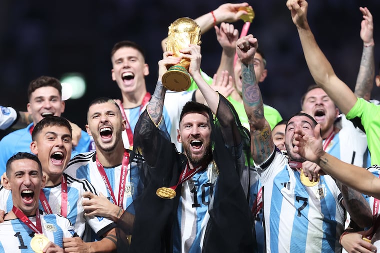 Lionel Messi of Argentina lifts the FIFA World Cup Qatar 2022 Winner's Trophy during the FIFA World Cup Qatar 2022 Final match between Argentina and France at Lusail Stadium on December 18, 2022, in Lusail City, Qatar.