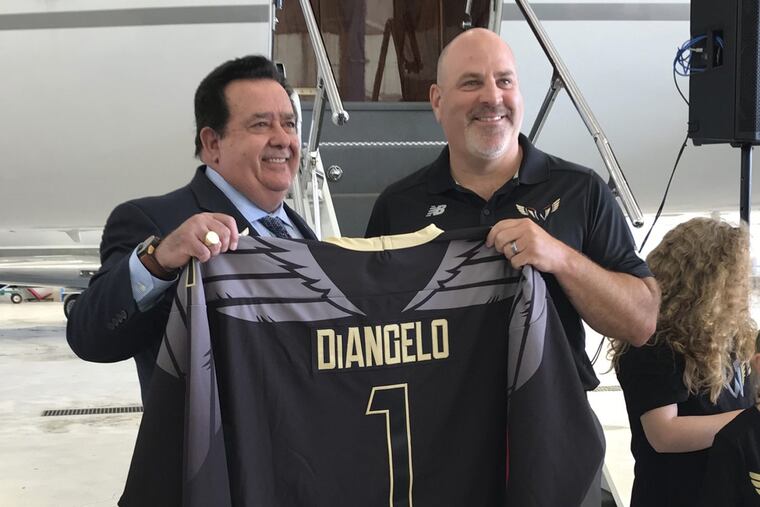 Paul Day (right) is the Wings' coach and general manager.