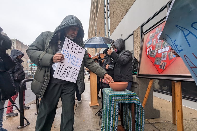 The Rev. Christopher Neilson and members of the congregations of Holy Innocents and St. Joan of Arc Churches gathered Nov. 19 for an interfaith prayer vigil outside the Philadelphia ICE office.