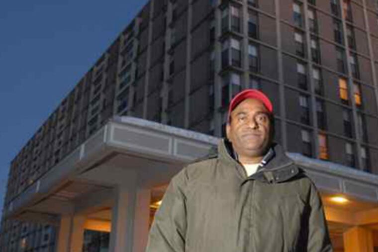 Marquis Apartments tenant Anjan Veeramalla stands in front of the King of Prussia complex, which has twice almost been declared uninhabitable. (RON TARVER/Staff Photographer)