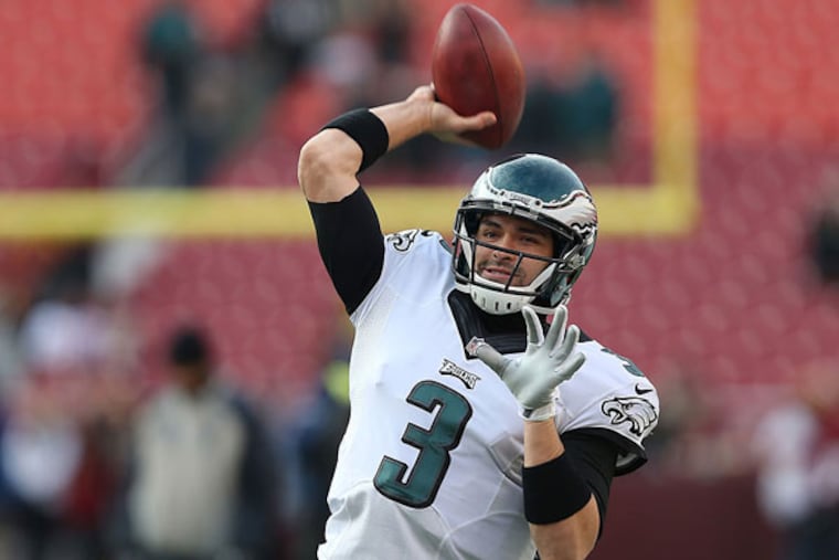 Eagles' Mark Sanchez warms-up before the Philadelphia Eagles play the Washington Redskins at FedEx Field in Landover, MD on December 20, 2014. (David Maialetti/Staff Photographer)