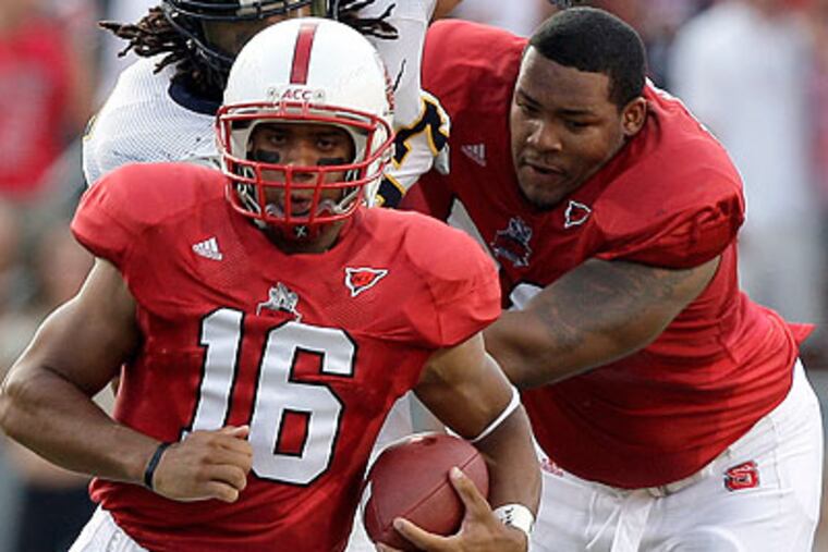 North Carolina State's Jeraill McCuller (right) was among the Eagles' undrafted rookie signings. (Michael Conroy/AP)