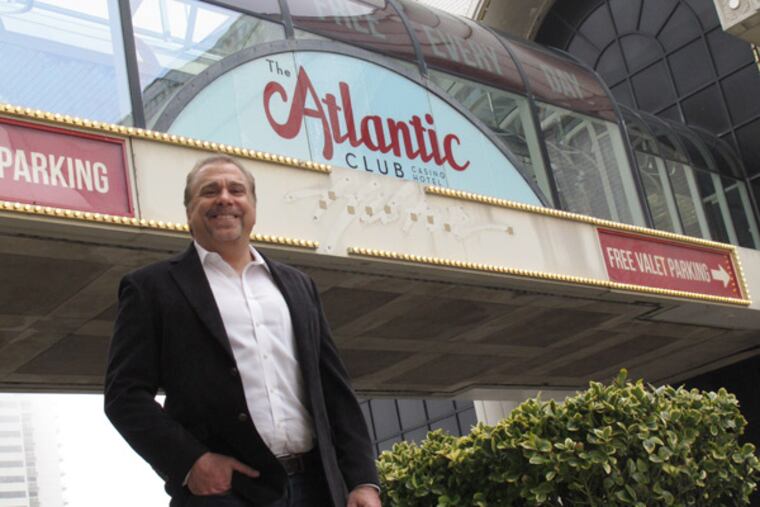 FILE - In this March 13, 2012 file photo, Michael Frawley, chief operating officer of The Atlantic Club, poses in front of the Atlantic City N.J. casino on the day it changed its name from ACH. (AP Photo/Wayne Parry, File)