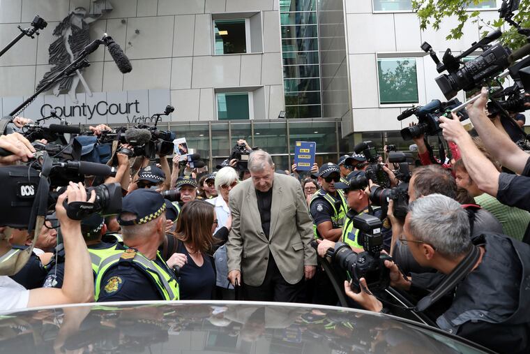 Cardinal George Pell leaves the County Court in Melbourne, Australia, Tuesday, Feb. 26, 2019. The most senior Catholic cleric ever charged with child sex abuse has been convicted of molesting two choirboys moments after celebrating Mass, dealing a new blow to the Catholic hierarchy's credibility after a year of global revelations of abuse and cover-up. (David Crosling / AAP Image via AP)