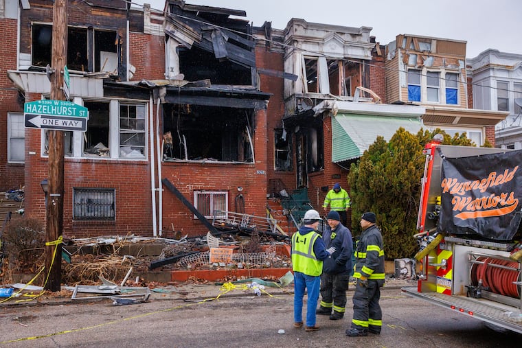 License and Inspection employee speaking with Philadelphia Fire Department outside fire, 5300 block of Havenhurst Street, Philadelphia, overnight, Tuesday, March 3, 2026. Several fire fighters were injured at this fire scene.