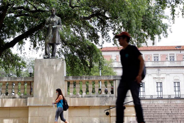 The statue of Jefferson Davis on the University of Texas campus in Austin. As students take aim at Davis, the number of sites in Texas on public and private land that honor the Confederacy is growing.