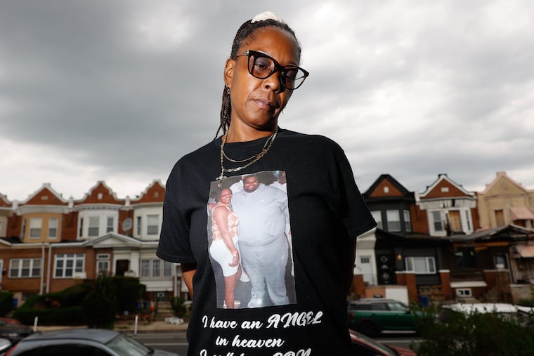 Terri Veracruz stands at her West Philadelphia home wearing a shirt with an image of her and her son on Thursday, April 6, 2023. Veracruz's son, Terrell White, was killed on March 4, 2023. The morning after she buried her son, she saw an Allen Domb campaign television ad with the car her son had been driving.
