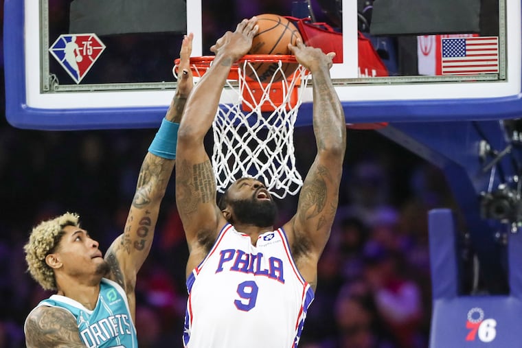 76ers center DeAndre Jordan dunking over Charlotte Hornets guard Kelly Oubre Jr. on Saturday.