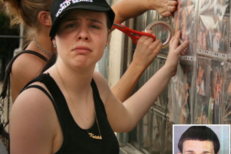 Krista Weyman mourned at a makeshift memorial for Rachel Marcelis, who was shot and killed outside of Fat Pete's Bar in Torresdale. Police have arrested Michael Elliott, inset. (Jimmy Viola / staff photographer)