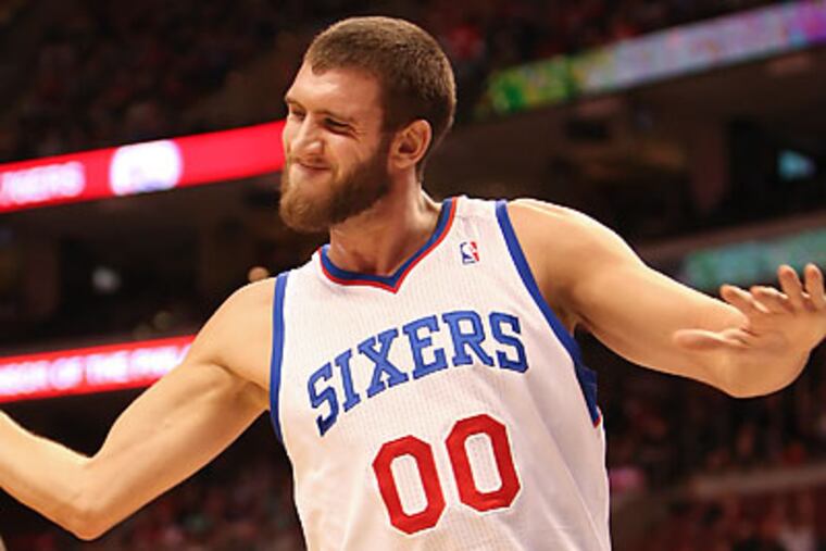 76ers starting center Spencer Hawes has been hindered by back and Achilles' problems. (Steven M. Falk/Staff file photo)
