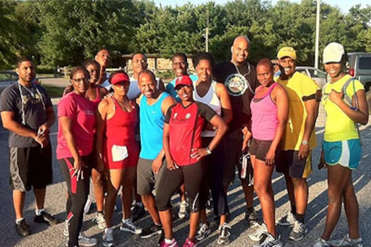 Some of the 50 members of Steel Force. "We've done barbecues and put together group trips to the beach, where everybody brings their family," said member Rod Elam. "We've done dinner parties. ... It makes it so much bigger than running, the relationships we've built."