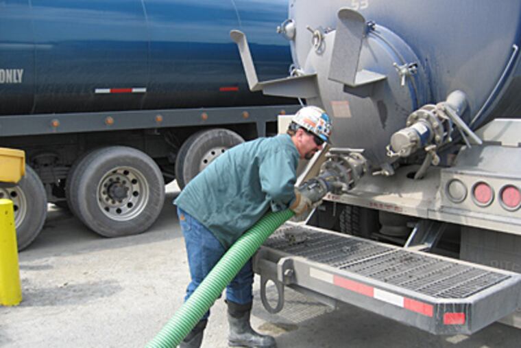 Filling up at gas-driller Chesapeake Energy's water station in Wysox on the Susquehanna in Bradford County. (Andrew Maykuth/Staff)