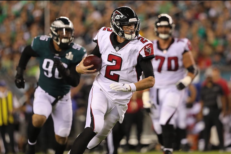 Falcons Matt Ryan runs with the ball in the 2nd quarter as the Philadelphia Eagles play the Atlanta Falcons in Philadelphia, PA on September 6, 2018. DAVID MAIALETTI / Staff Photographer