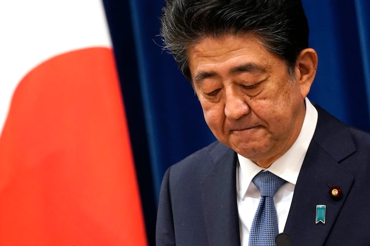 Japanese Prime Minister Shinzo Abe speaks during a press conference at the prime minister official residence in Tokyo Friday, Aug. 28, 2020. Abe, Japan’s longest-serving prime minister, says he’s resigning because a chronic illness has resurfaced.