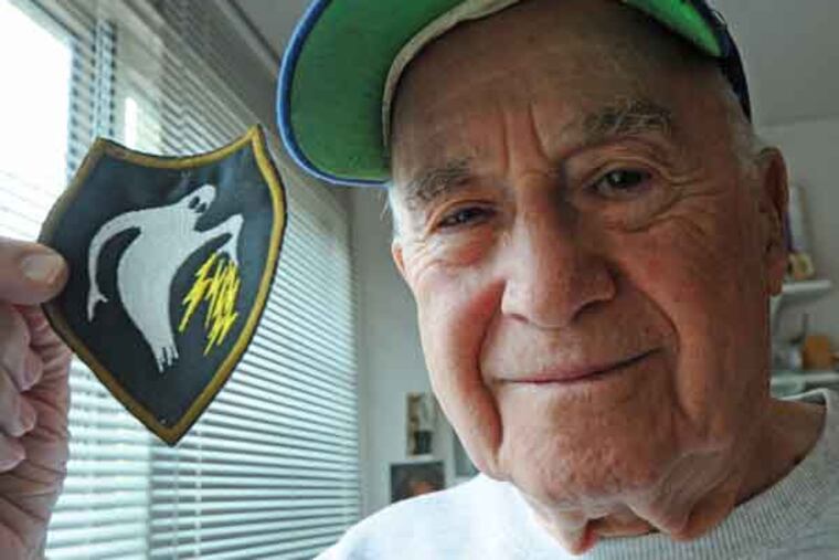 Bernie Mason of Wynnewood with insignia of the 23d Headquarters Special Troops - the Ghost Army. APRIL SAUL / Staff Photographer
