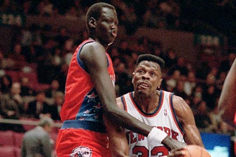 Former 76ers center Manute Bol died Saturday at the age of 47. (Jim Sulley/AP file photo)