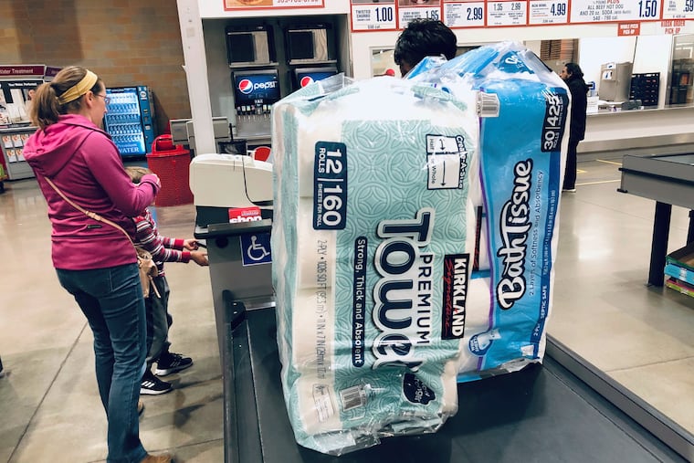 Some customers and retailers in the Philadelphia region say they had seen heightened demand for paper products because of the port strike, despite the fact that most toilet paper and paper towels are made domestically. In this 2020 file photo, a Colorado shopper buys toilet paper amid that year's pandemic-induced panic-buying spree.