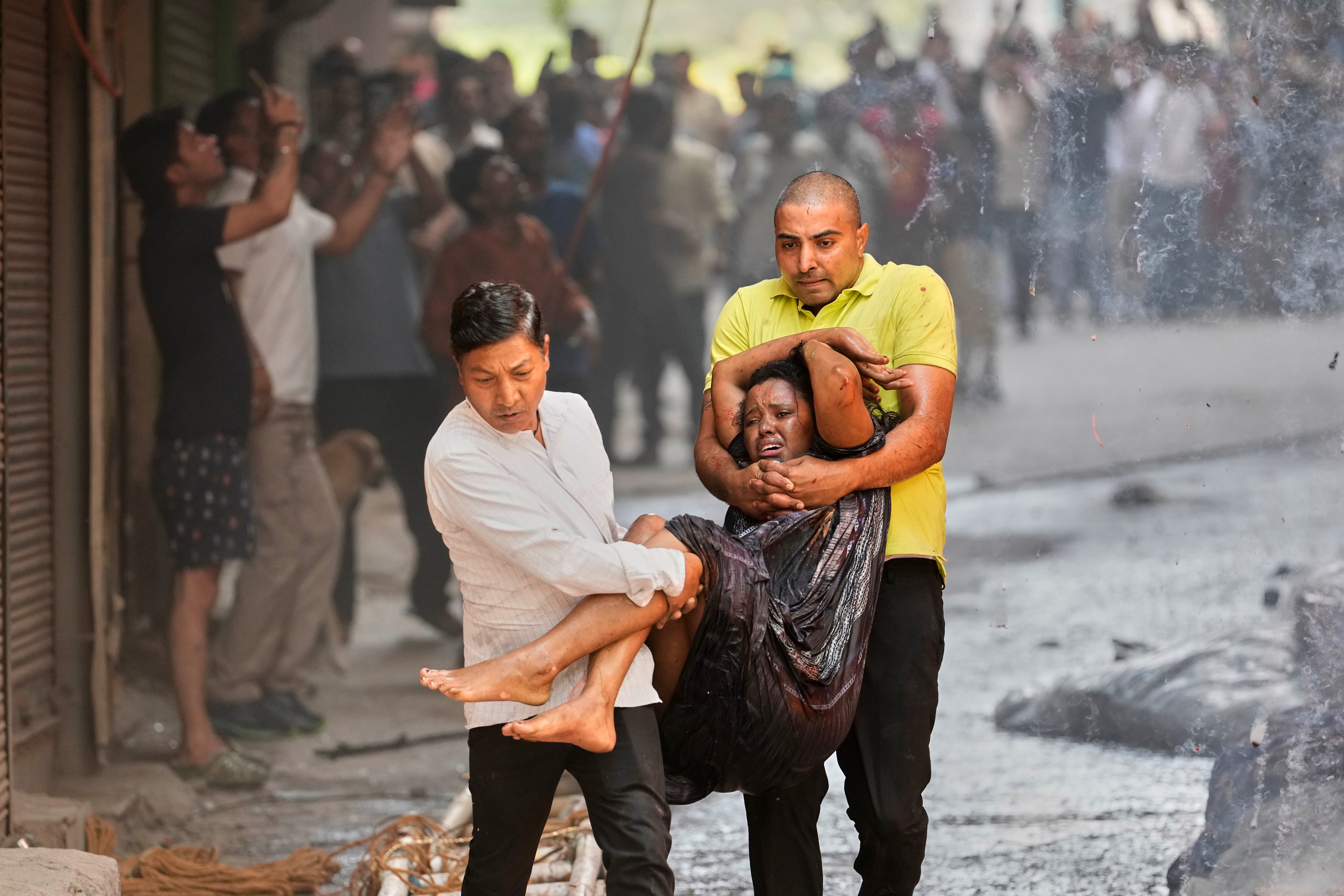 Photos show rescue efforts and aftermath of New Delhi building fire