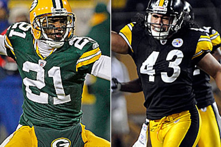 Charles Woodson (left) and Troy Palamalu will try to help their teams to a win in Sunday's Super Bowl. (AP Photos)