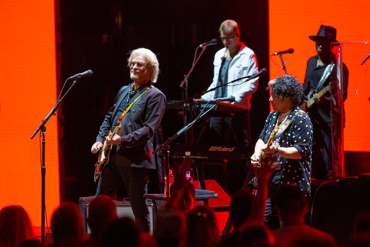Daryl Hall (left) and John Oates during their performance at the 2021 HoagieNation fest at the Mann Center. Hall is attempting to stop Oates from selling a portion of the duo's song catalog, according to court filings.