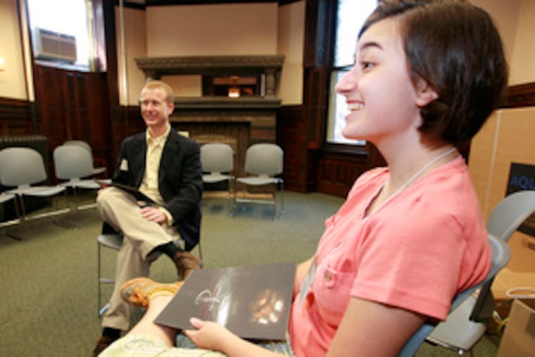 Philadelphia University student Stefanie Loglisci gets details from Tom Schrand about the environmental sustainability major.