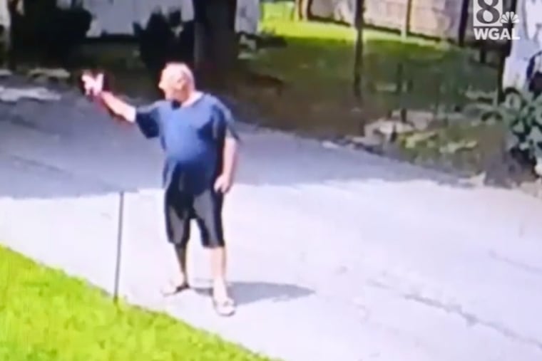 In this security cam footage submitted as evidence in his case, Stephen Kirchner mimics shooting a gun with his hand at neighbor Josh Klingseisen. The Pennsylvania Superior Court upheld Kirchner's conviction on a misdemeanor disorderly conduct charge this week. (Screen grab: WGAL-TV)