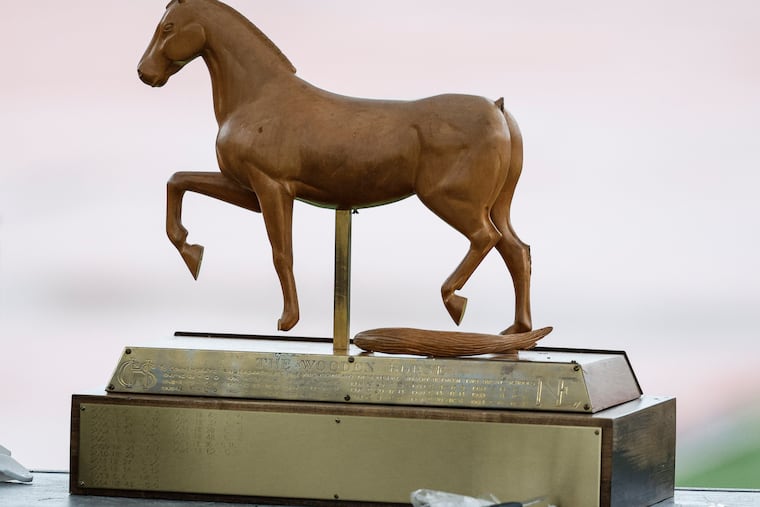 The wooden horse trophy, given to the winning team in the annual Northeast-Central Thanksgiving football game, missing its tail last year.