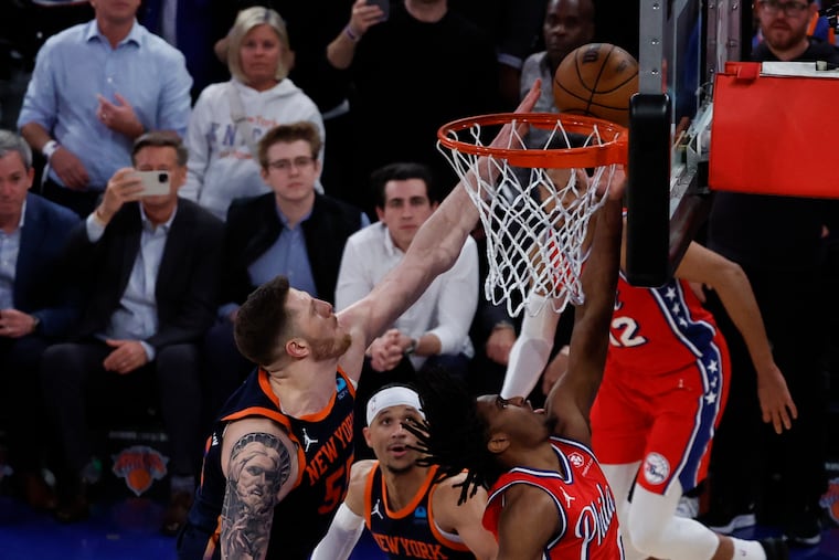 New York Knicks center Isaiah Hartenstein blocks Sixers guard Tyrese Maxey’s lay-up late in the game during Game 2.