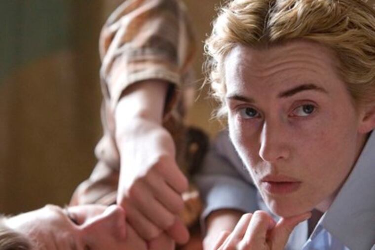 David Kross and Kate Winslet star in "The Reader," about an affair between a woman and a student.