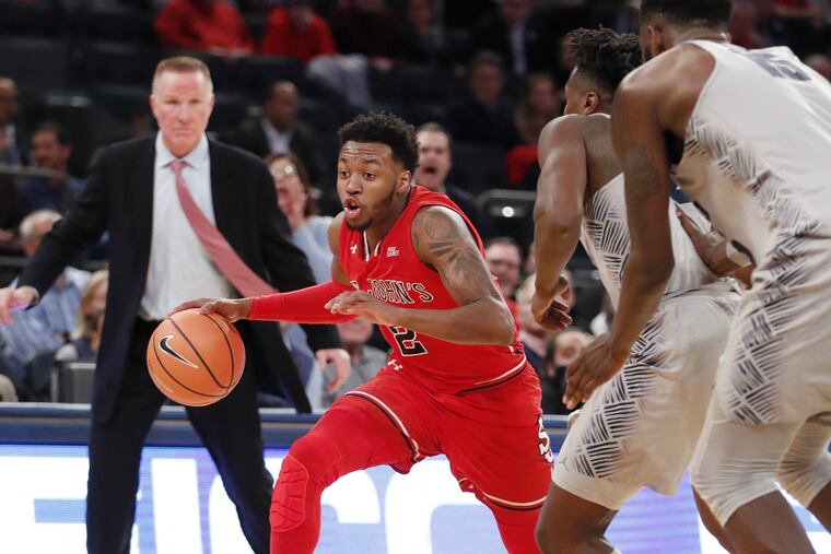 Shamorie Ponds is the Big East preseason player of the year, and he and Chris Mullin (left) are trying to bring St. John's to the top of the conference in 2018-19.
