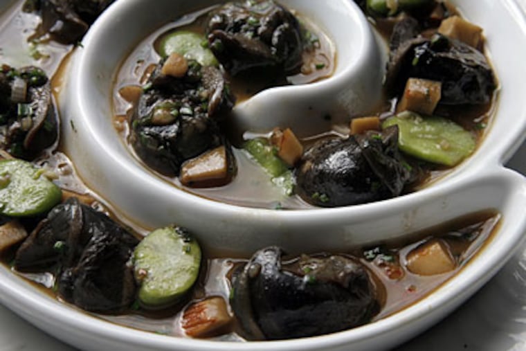 The escargot appetizer brings tender snails in Bordelaise gravy, with green favas and wild mushrooms. (AKIRA SUWA / Staff Photographer)