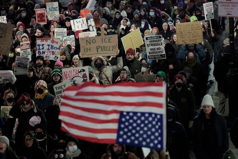 Protesters march up Eighth Street during the Philly Stands With Minneapolis Ice Out For Good protest on Friday, Jan. 23, 2026.