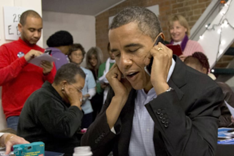 President Barack Obama visits a campaign office, Monday, Nov. 5, 2012, in the German Village section of Columbus, Ohio, to greet and make phone calls to volunteers. (AP Photo/Carolyn Kaster)