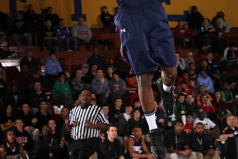 Aaron Brown dunks for Penn Wood, which will meet York in a PIAA Class AAAA playoffs first-round game on Saturday.