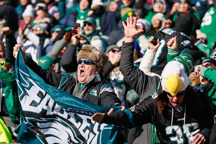 Eagles fans sing the fight song after a touchdown in during the first quarter against the New York Giants Sunday, Jan. 5, 2025, in Philadelphia.