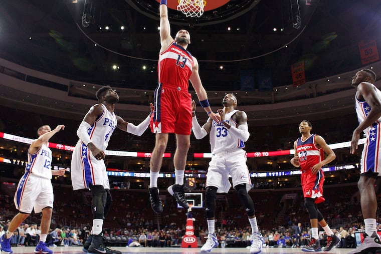 The Wizards' center Marcin Gortat had a team-high tying 16 points to go with four rebounds, three assists, a block, and a steal in Washington's 127-118 victory over the Sixers at the Wells Fargo Center on Friday night.