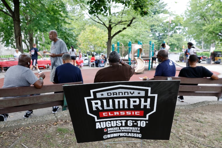 Basketball players and community members enjoy a BBQ after basketball games at the Rumph-Mallery Recreation Center on Sunday.