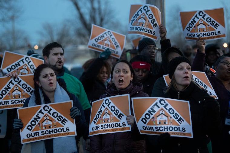 Educators, parents, and Chester community members rally in support of Chester Upland public schools the night before a 2019 court hearing on one charter school's petition to have all of Chester Upland's preK-8 schools converted to charters.