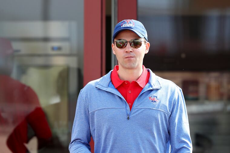 Phillies GM Matt Klentak leaves after watching the bullpen sessions at spring training Thursday.