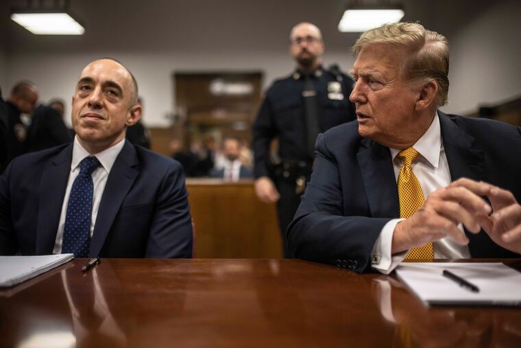 Former President Donald Trump sits in a courtroom next to his lawyer Emil Bove (left) before the start of the day's proceedings in Manhattan criminal court in May 2024.