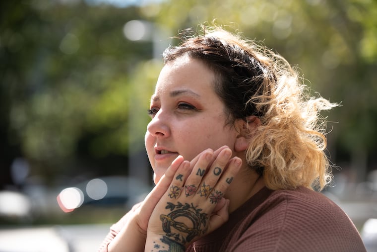 Philadelphia-based musician Shannen Moser speaks about their newest album at Columbus Square Park in South Philadelphia. The record, "The Sun Still Seems to Move," is out on Lame-O Records.
